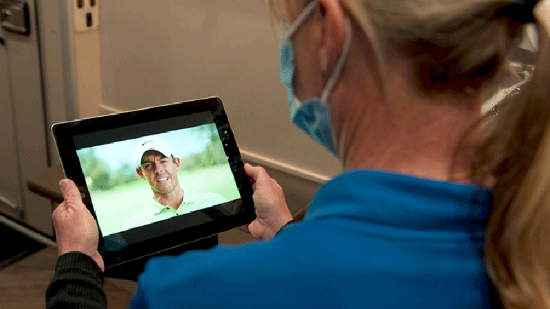 Clinician from St. Vincent's Mobile Health Unit receiving a video invitation from Rory McIlroy