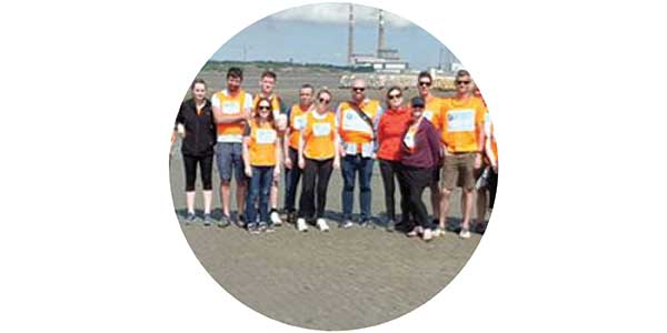 Optum colleagues volunteering to clean up the beach